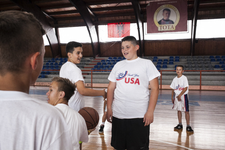 A group of children play basketball during a friendly tournament under the name “Thank you USA “, commemorating July 4, Independence Day. It´s an annual tournament organized by the Vushhtrii Basketball School, whose coaches feel a great devotion and thank