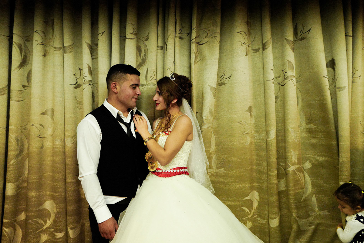 Yaprak and Cikan Aileleri celebrating their wedding. They organized a typical kurdish ceremony inside a ballroom in Warabi